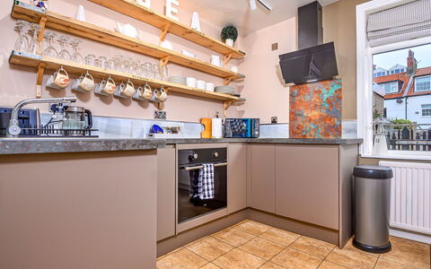 Tenby Cottage: Kitchen, Major Appliance, Kitchen Appliance, Interior Design, Flooring, Countertop, Cabinetry, Room, Home Appliance, Furniture