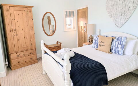 Tenby Cottage: Bed, Furniture, Bedding, Bedroom, Interior Design, Bed Sheet, Linens, Wood, Room, Throw Pillow