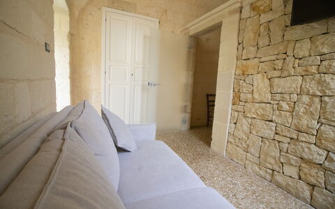 Coclea Heritage Suites: Wall, Flooring, Floor, Stone Wall, Brick, Living Room