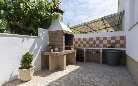 Estrella Ii: Home, Door, Cottage, Yard, Chair, Outdoor Furniture, Backyard, Outdoor Table, Houseplant, Awning