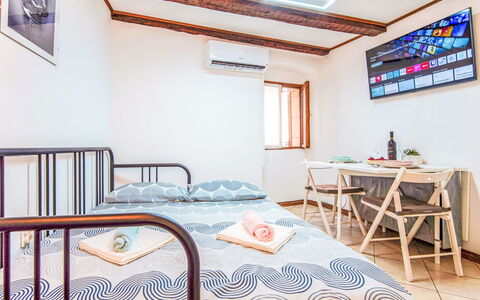 Piccolo Mondo: Wall, Bedroom, Bed, Bed Sheet, Interior Design, Bedding, Linens, Furniture, Home, Apartment