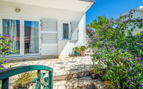 Brodarica 150: Home, Door, Cottage, Yard, Chair, Outdoor Furniture, Backyard, Outdoor Table, Houseplant, Awning