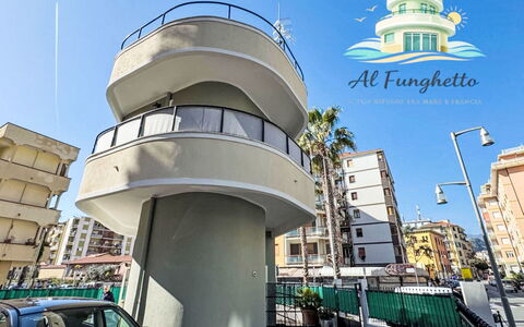 Il Funghetto: Home, Door, Cottage, Yard, Chair, Outdoor Furniture, Backyard, Outdoor Table, Houseplant, Awning