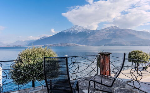 La Terrazza sul Lago: Home, Door, Cottage, Yard, Chair, Outdoor Furniture, Backyard, Outdoor Table, Houseplant, Awning