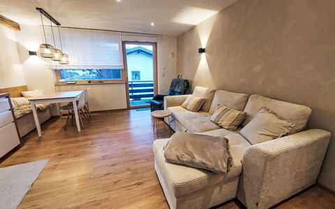 Enzian: Furniture, Interior Design, Flooring, Floor, Wall, Couch, Wood, Ceiling, Room, Living Room