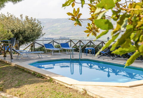Casale Dolcemare: Blue, Swimming Pool, Outdoor Furniture, Resort, Chair, Shade, Eco Hotel, Landscaping, Sunlounger, Outdoor Structure