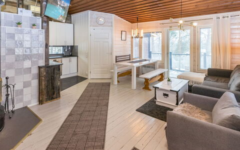 Villa Kökköharju: Wood, Interior Design, Flooring, Ceiling, Furniture, Floor, Home, Wood Flooring, Lighting, Light Fixture