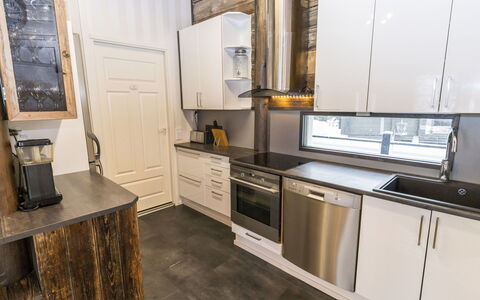 Villa Kökköharju: Wood, Major Appliance, Flooring, Kitchen Appliance, Kitchen, Countertop, Floor, Cabinetry, Interior Design, Ceiling