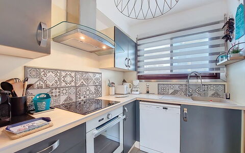 Juliette: Kitchen, Countertop, Major Appliance, Kitchen Appliance, Interior Design, Cabinetry, Plumbing Fixture, Flooring, Sink, Home