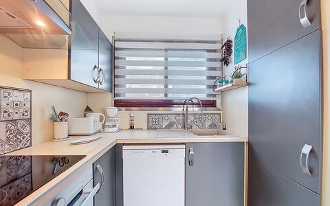 Juliette: Kitchen, Countertop, Kitchen Appliance, Major Appliance, Interior Design, Cabinetry, Wood, Furniture, Plumbing Fixture, Flooring
