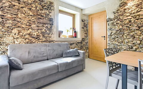Valtellina 645: Flooring, Wood, Interior Design, Floor, Furniture, Couch, Room, Living Room, Stone Wall, Ceiling