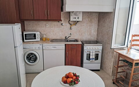Albuquerque: Furniture, Major Appliance, Kitchen Appliance, Flooring, Kitchen, Floor, Wood, Interior Design, Home Appliance, Countertop