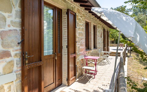 Il Giuncheto Apartments, Pool, Umbrian Countryside: Wood, Door, Home Door, Cottage, Porch, Hardwood, Wood Stain, Shade, Flowerpot, Yard