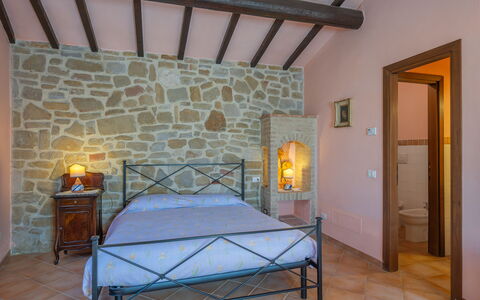 Il Giuncheto Apartments, Pool, Umbrian Countryside: Furniture, Interior Design, Flooring, Floor, Bed, Ceiling, Bedroom, Room, Home, Bedding