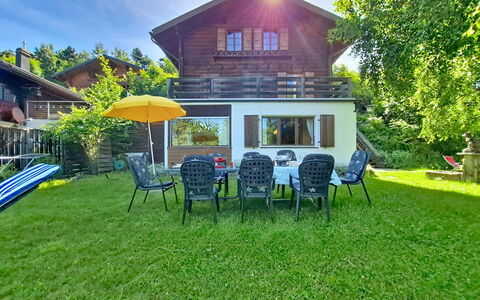 Chalet le Rhônasson: House, Home, Shrub, Cottage, Roof, Garden, Lawn, Estate, Yard, Landscaping