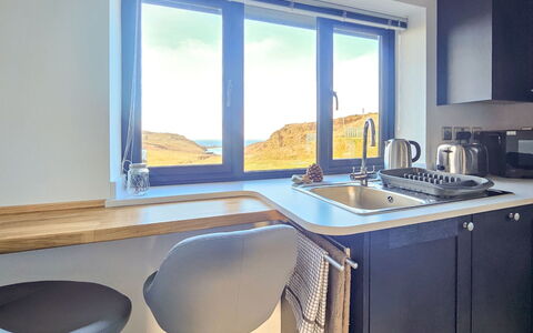 The Studio: Furniture, Interior Design, Kitchen Appliance, Kitchen, Countertop, Flooring, Cabinetry, Lighting, Major Appliance, Room