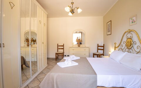Dimora Lali: Furniture, Flooring, Interior Design, Floor, Ceiling, Bedroom, Room, Bed, Apartment, Table
