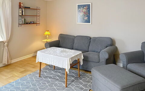 Villa Gärdet: Furniture, Flooring, Interior Design, Floor, Couch, Wall, Wood, Living Room, Room, Apartment