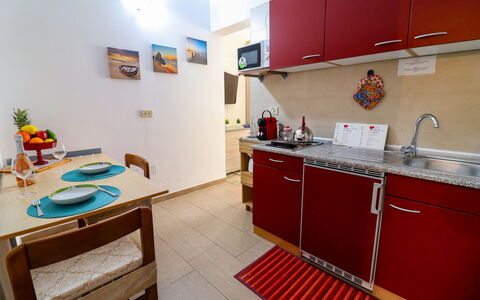 Kyma'S House: Flooring, Wood, Major Appliance, Furniture, Floor, Interior Design, Kitchen Appliance, Room, Kitchen, Apartment