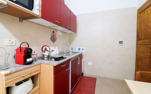 Kyma'S House: Kitchen Appliance, Kitchen, Major Appliance, Flooring, Countertop, Wood, Cabinetry, Kitchen Sink, Furniture, Floor
