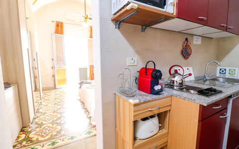 Kyma'S House: Wood, Flooring, Major Appliance, Floor, Interior Design, Kitchen Appliance, Furniture, Room, Kitchen, Countertop