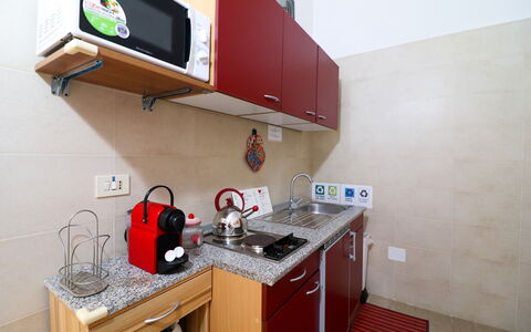 Kyma'S House: Kitchen Appliance, Kitchen, Major Appliance, Countertop, Flooring, Small Appliance, Cabinetry, Kitchen Sink, Sink, Home Appliance
