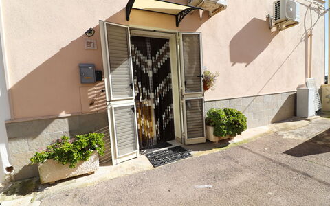 Kyma'S House: Door, Flowerpot, Home Door, Houseplant, Balcony