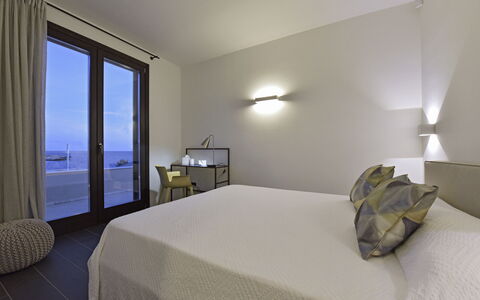 Villa Stornella: Interior Design, Wood, Flooring, Floor, Furniture, Bedroom, Lighting, Ceiling, Room, Bed