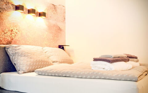 Grubhof: Bedroom, Bed, Bedding, Furniture, Bed Sheet, Linens, Interior Design, Textile, Lighting, Throw Pillow