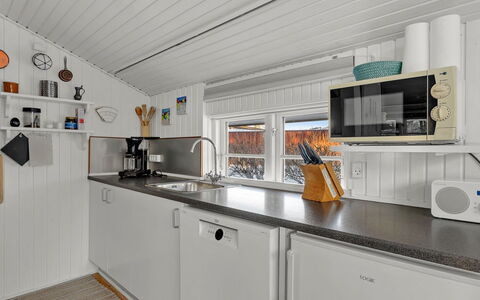Kato - 125M from the Sea: Wood, Kitchen, Major Appliance, Countertop, Kitchen Appliance, Kitchen Stove, Home Appliance, Kitchen Sink, Cabinetry, Wood Stain