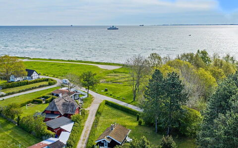 Kato - 125M from the Sea: Roof, House, Home, Cottage, Siding, Estate, Driveway, Garden Buildings, Yard, Shed