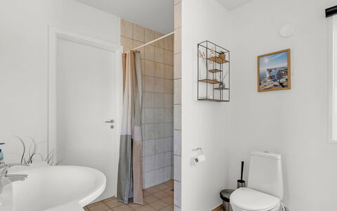 Angret - 380M from the Sea: Flooring, Floor, Wall, Interior Design, Plumbing Fixture, Toilet, Bathroom, Toilet Seat, Ceiling, Plumbing