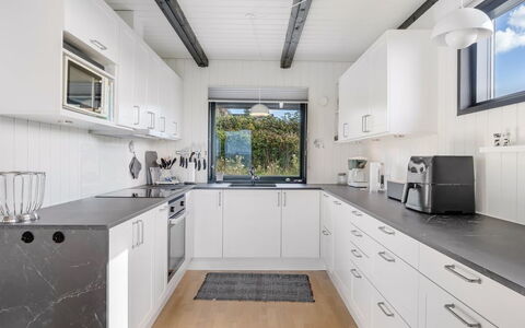 Gertina - 100M from the Sea: Kitchen, Countertop, Kitchen Appliance, Major Appliance, Interior Design, Cabinetry, Ceiling, Flooring, Home Appliance, Sink