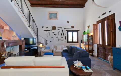 Villa Ophelia: Furniture, Wall, Interior Design, Flooring, Couch, Chair, Living Room, Table, Floor, Home