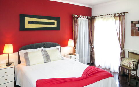 Vivenda Rafael: Bed, Furniture, Bedding, Bedroom, Interior Design, Bed Sheet, Red, Linens, Floor, Room