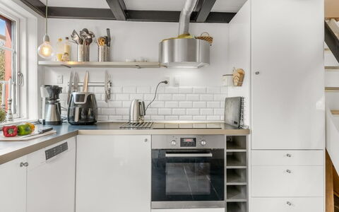Reika - 500M from the Sea: Kitchen, Kitchen Appliance, Countertop, Major Appliance, Flooring, Wall, Cabinetry, Interior Design, Home Appliance, Kitchen Stove