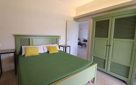 Elegante Villa Casale 50: Furniture, Bed, Interior Design, Bedroom, Wood, Floor, Flooring, Ceiling, Lighting, Room