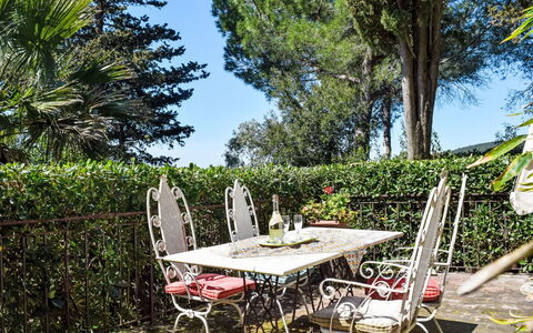 Rosignano Marittimo 13: Furniture, Outdoor Furniture, Table, Outdoor Table, Chair, Shrub, Garden, Kitchen & Dining Room Table, Shade, Yard