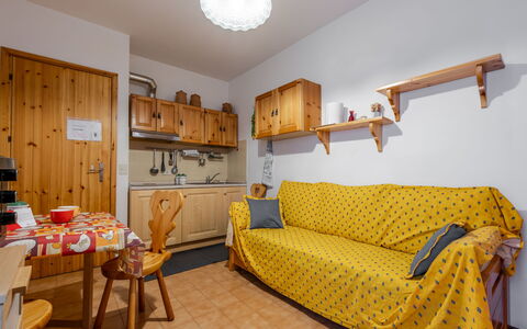 Ai Piedi del Monte: Furniture, Wood, Interior Design, Room, Home, Apartment, Ceiling, Wood Stain, Chair, Cabinetry