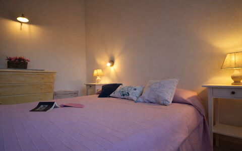 Appartamento Tamara, Budoni: Bed, Bedroom, Bed Sheet, Furniture, Bedding, Interior Design, Linens, Room, Ceiling, Lighting