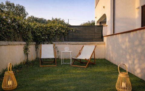 Appartamento Tamara, Budoni: Furniture, Outdoor Furniture, Chair, Garden, Backyard, Shade, Lawn, Wood Stain, Yard, Landscaping