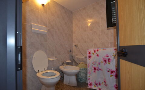 Appartamento Agrustos, Wifi, Ac: Plumbing Fixture, Bathroom, Flooring, Floor, Interior Design, Toilet Seat, Sink, Toilet, Plumbing, Bathroom Sink