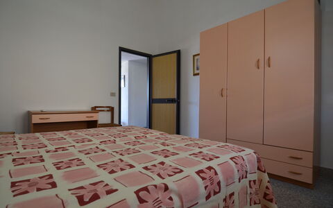 Appartamento Nina, Ac, Wifi: Bed, Bedroom, Interior Design, Furniture, Floor, Flooring, Bed Sheet, Bedding, Wood, Room