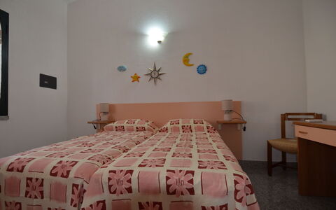 Appartamento Nina, Ac, Wifi: Bed, Furniture, Interior Design, Bedding, Bedroom, Bed Sheet, Floor, Wall, Room, Flooring