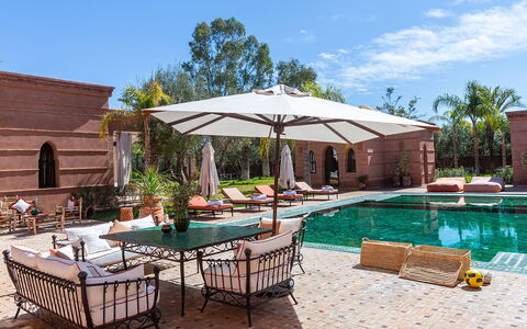 Villa Kanza: Swimming Pool, Resort, Outdoor Furniture, Water Feature, Umbrella, Estate, Hacienda, Courtyard, Shade, Sunlounger