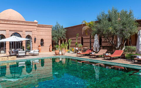 Villa Kanza: Swimming Pool, Resort, Outdoor Furniture, Reflection, Estate, Hacienda, Umbrella, Reflecting Pool, Water Feature, Sunlounger