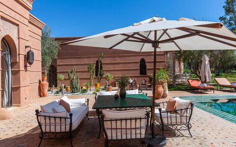 Villa Kanza: Furniture, Outdoor Furniture, Chair, Swimming Pool, Umbrella, Table, Resort, Outdoor Table, Patio, Flowerpot