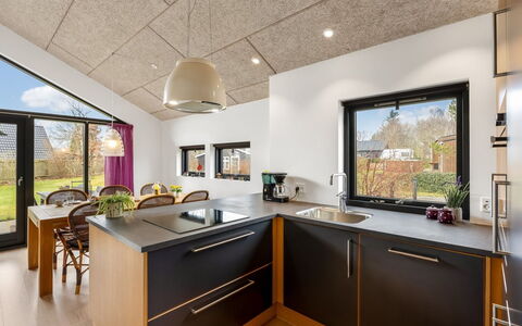 Anttoni - 350M from the Sea: Kitchen, Countertop, Interior Design, Furniture, Flooring, Wood, Kitchen Appliance, Ceiling, Floor, Cabinetry