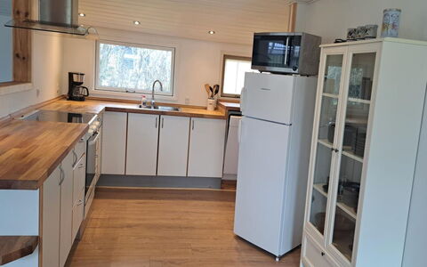 Stefana - from the Sea: Flooring, Countertop, Furniture, Kitchen, Kitchen Appliance, Floor, Wood, Interior Design, Cabinetry, Major Appliance