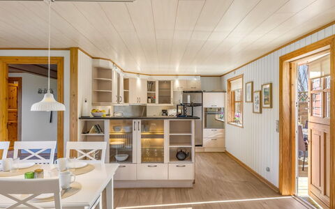 Elza - 700M from the Sea: Interior Design, Flooring, Wood, Ceiling, Furniture, Light Fixture, Floor, Wood Flooring, Lighting, Kitchen